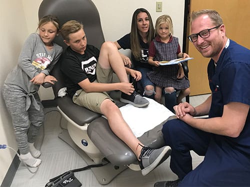 Dr Jarman Pediatric Podiatrist With Family